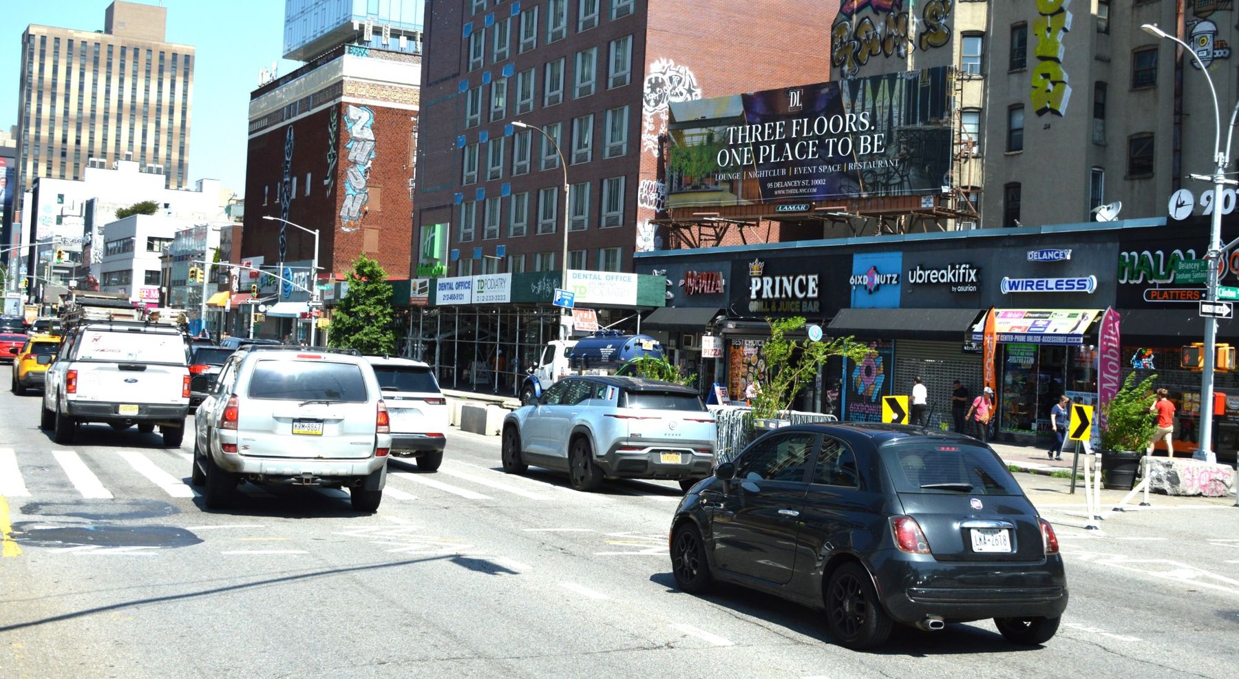 The DL billboard above Delancey Street, New York